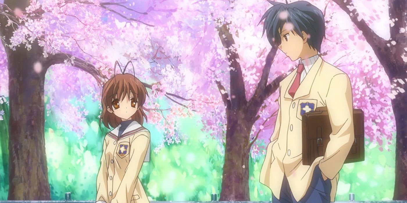 Nagisa Furukawa and Tomoya Okazaki under cherry blossoms in the anime series 'Clannad'