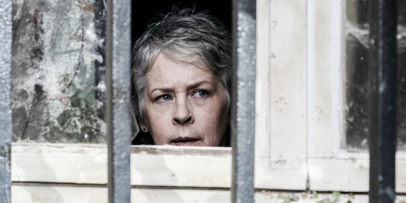 Melissa McBride's Carol looking through a window in The Walking Dead: Daryl Dixon Season 2, Episode 4