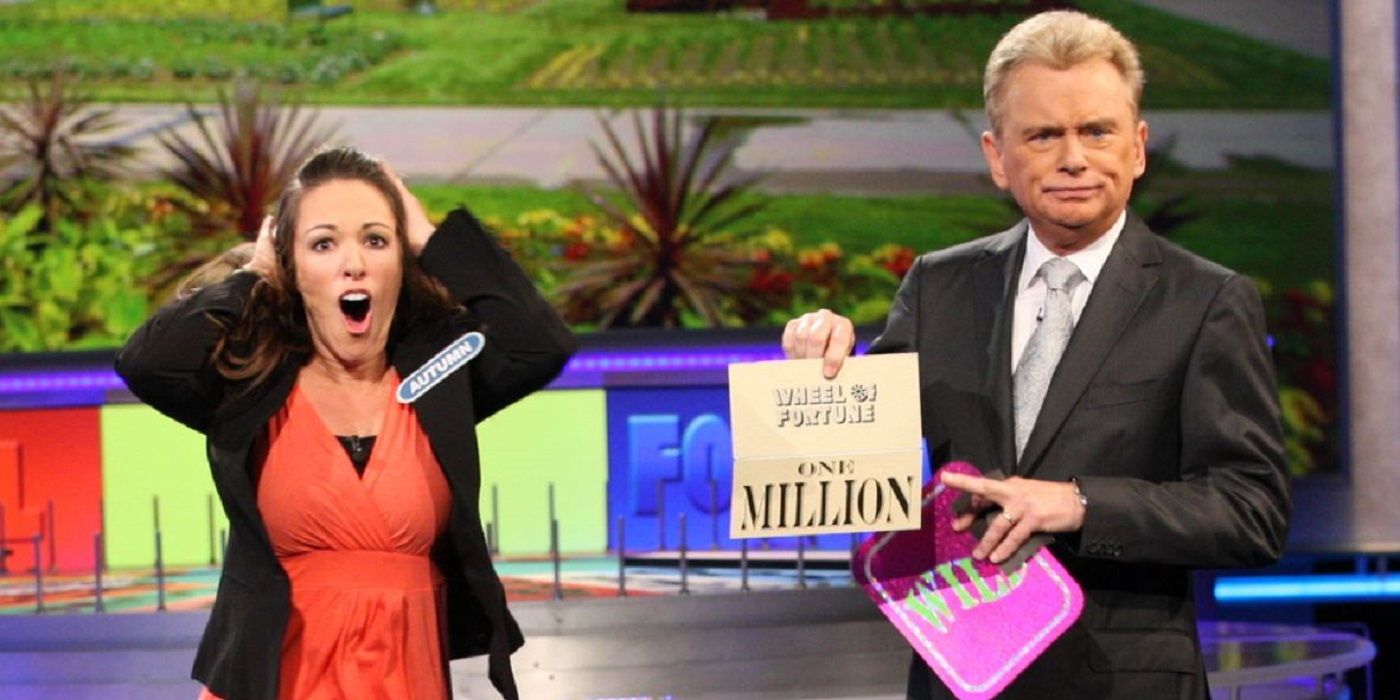 Autumn Erhard in shock as Pat Sajak holds a bonus card saying "one million" on Wheel of Fortune.