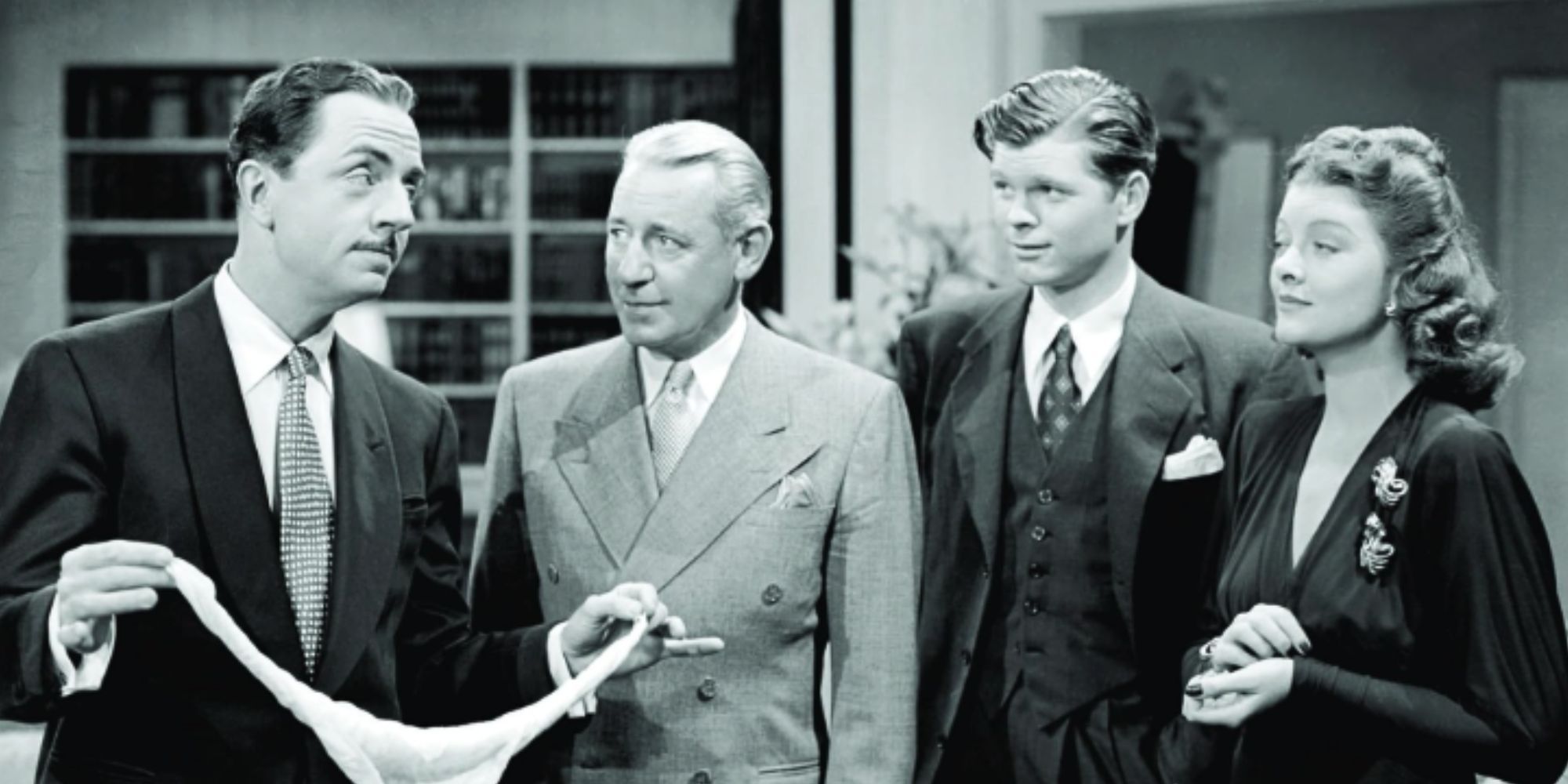 William Powell sostiene un paño con Henry O'Neill, Barry Nelson y Myrna Loy en 