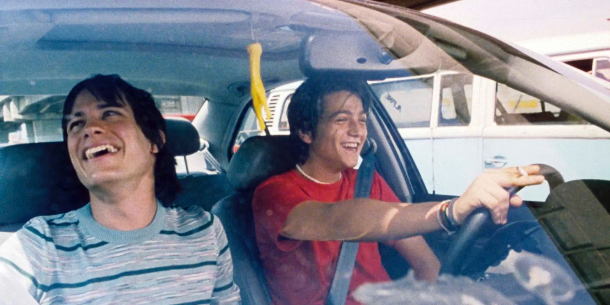 Julio and Tenoch laughing while driving around in Y Tu Mamá También