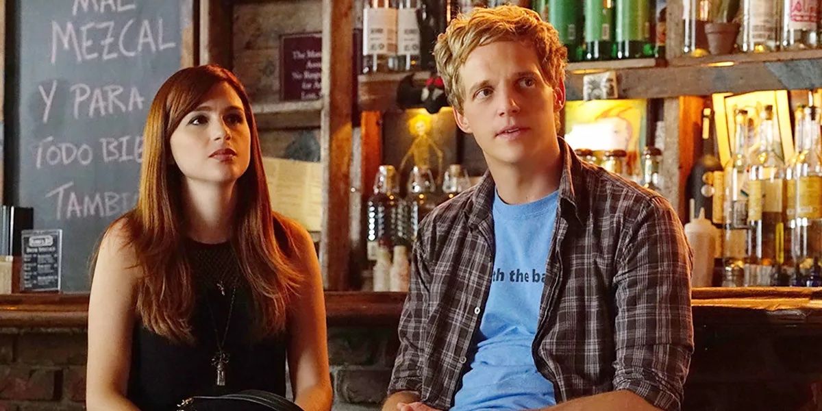 Gretchen (Aya Cash) and Jimmy (Chris Geere) sit on bar stools in FX's You're the Worst.