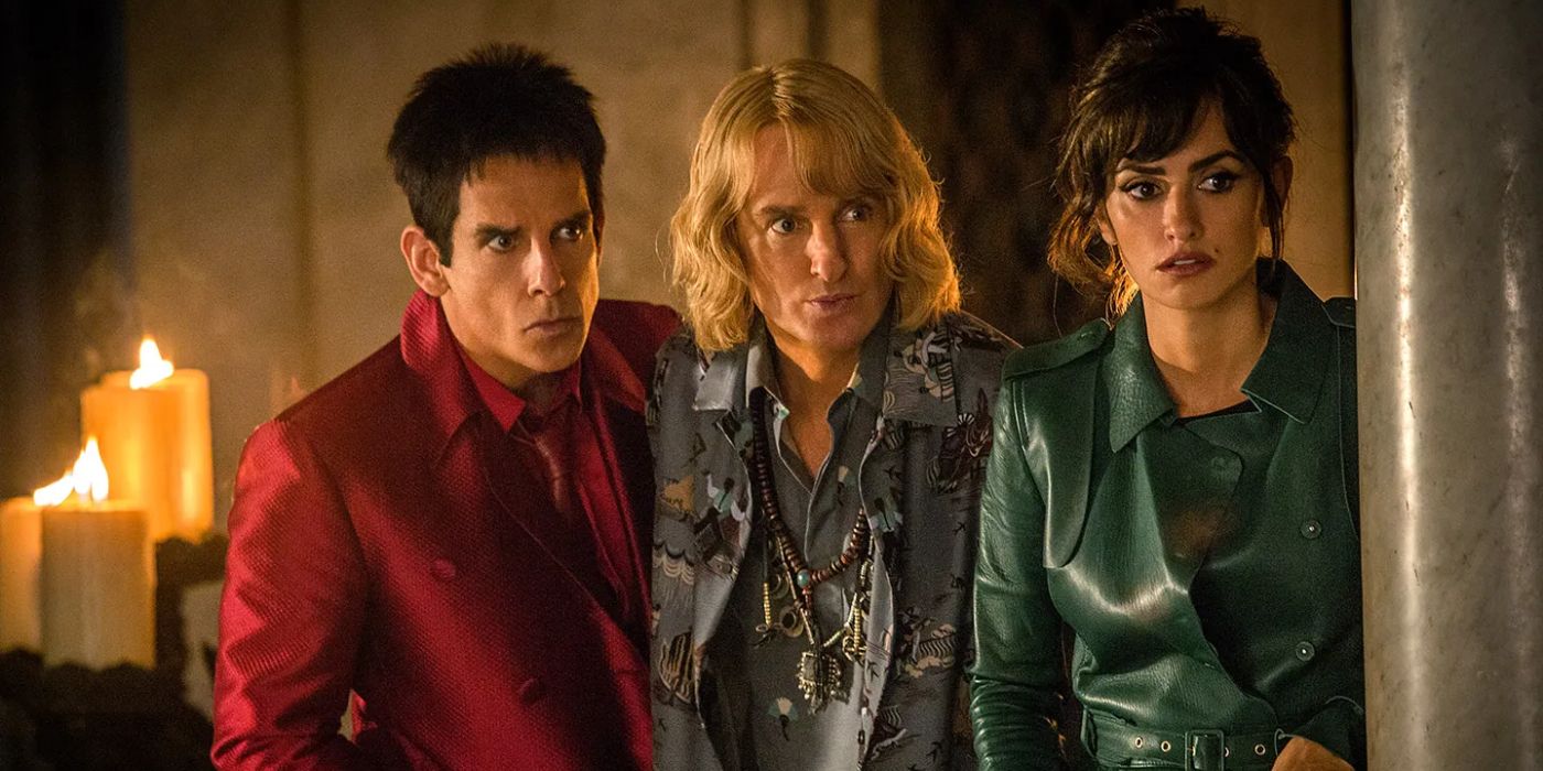 Two male models and an Interpol agent sneak through a candle-lit room in &lsquo;Zoolander 2&rsquo; (2016).