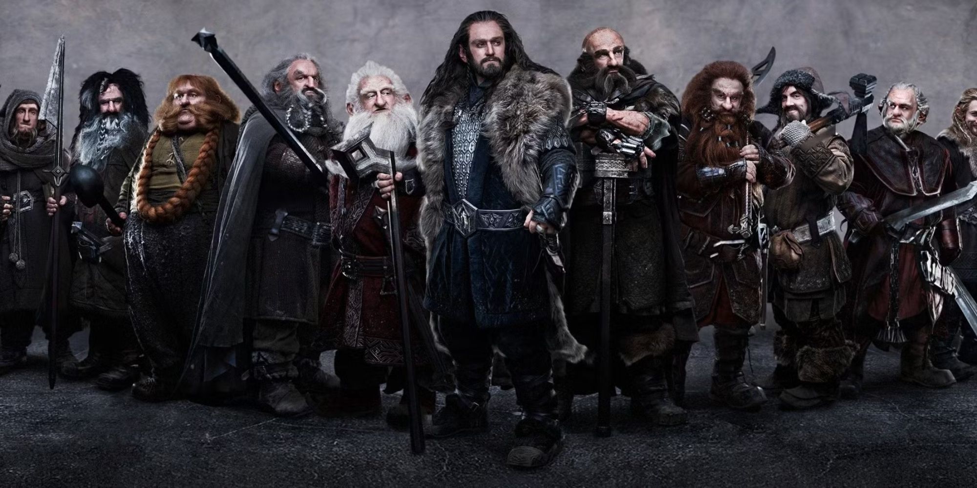 The Hobbit cast of dwarves standing in line