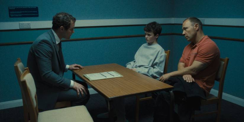 Mark Stanley as a lawyer sitting opposite Owen Cooper and Stephen Graham in 'Adolescence'.