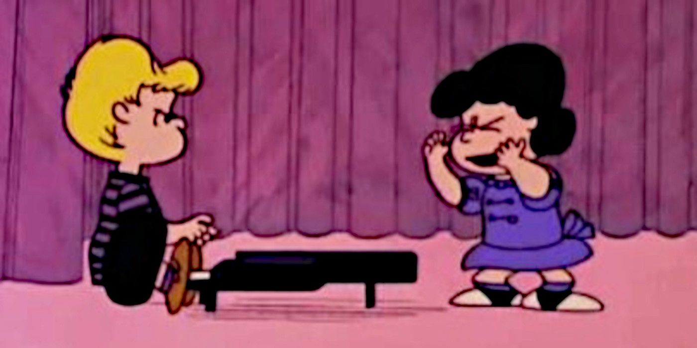 Schroeder angrily stares at Lucy while he plays the piano in A Charlie Brown Christmas