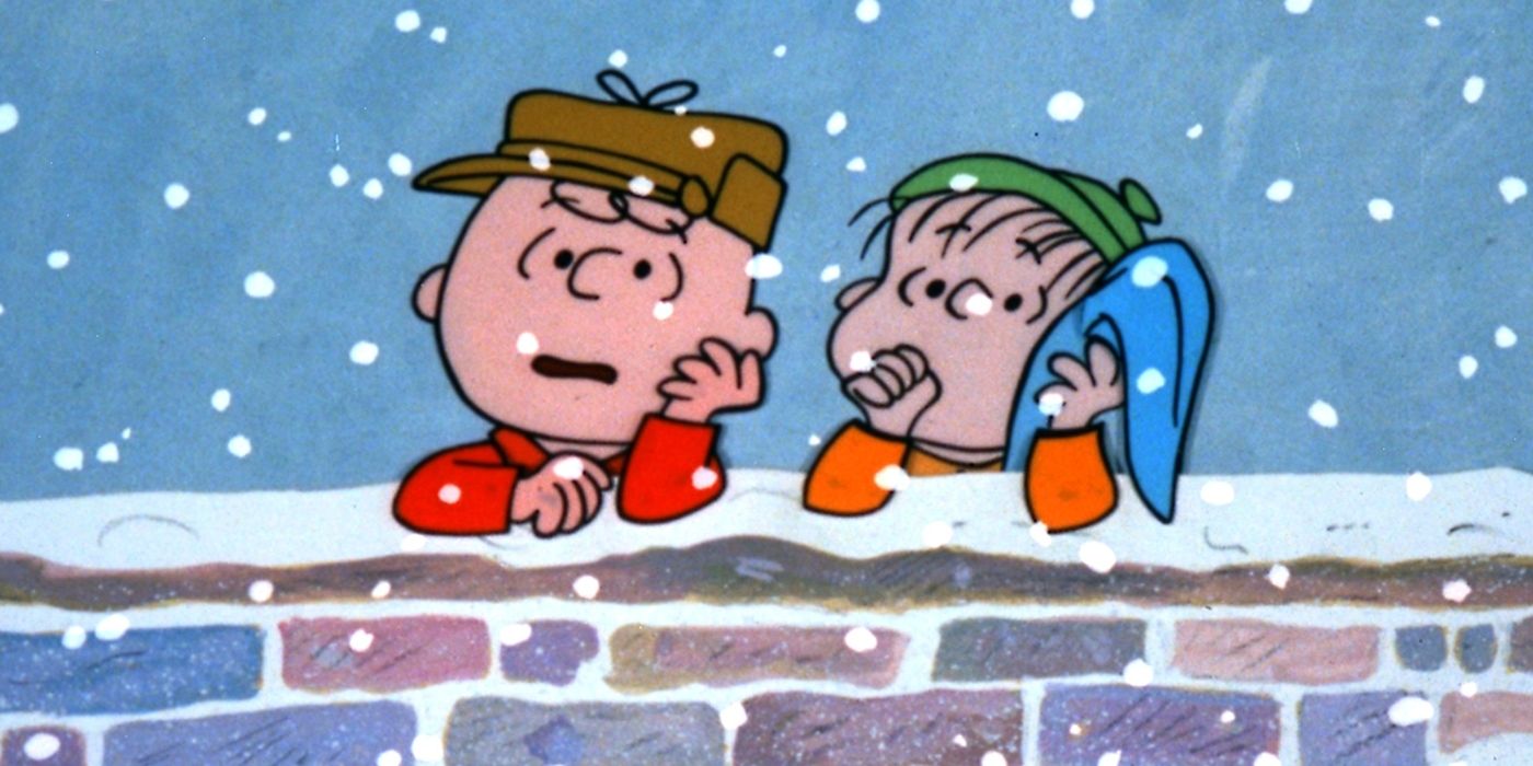 Charlie (Peter Robinns) and Linus (Christopher Shea) leaning on a brick wall in A Charlie Brown Christmas