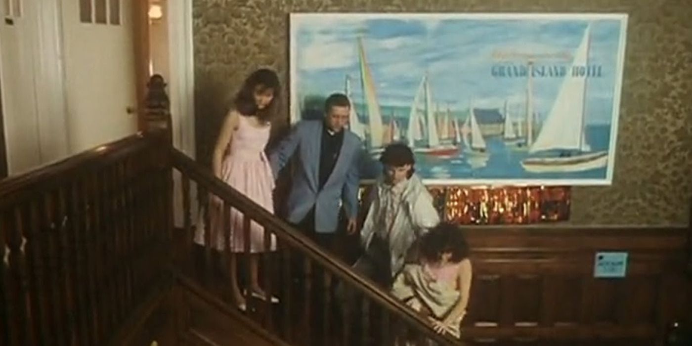 A family on a staircase in &lsquo;Jupiter Moon&rsquo; (1990)