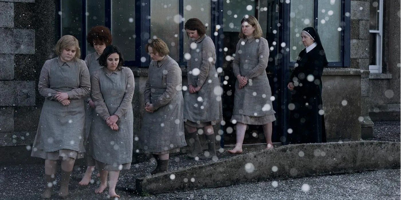 A group of women are seen walking out into the falling snow, barefoot, under the supervision of a nun in 'Small Things Like These'