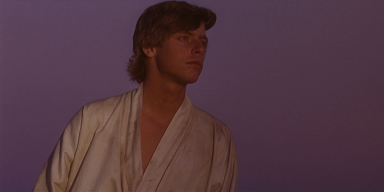 Luke Skywalker, played by Mark Hamill, looks out at the sunset in 'Star Wars: Episode IV – A New Hope'.