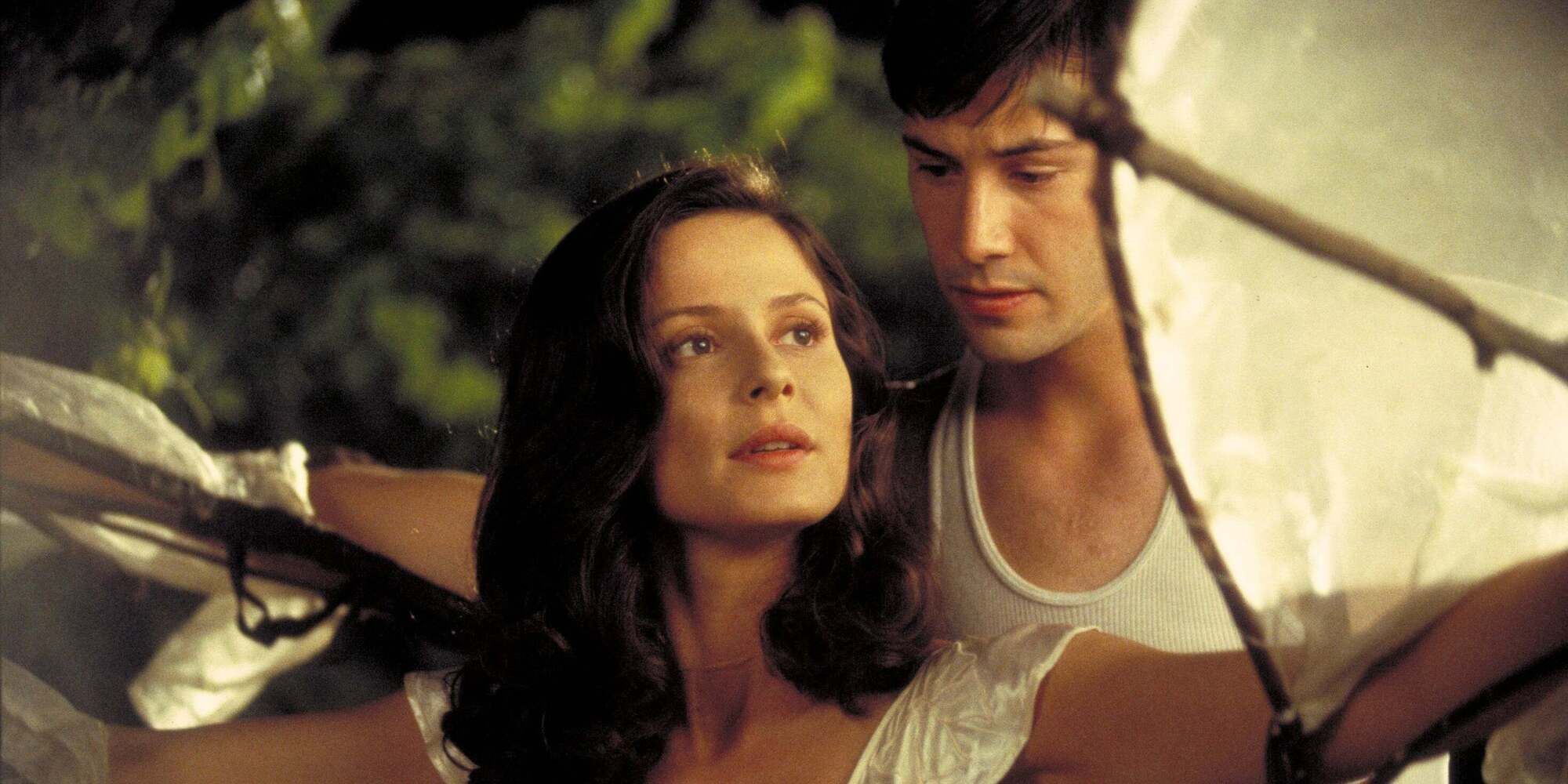Keanu Reeves as Paul Sutton helping out Aitana Sanchez-Gijon as Victoria Aragon in 'A Walk in the Clouds'
