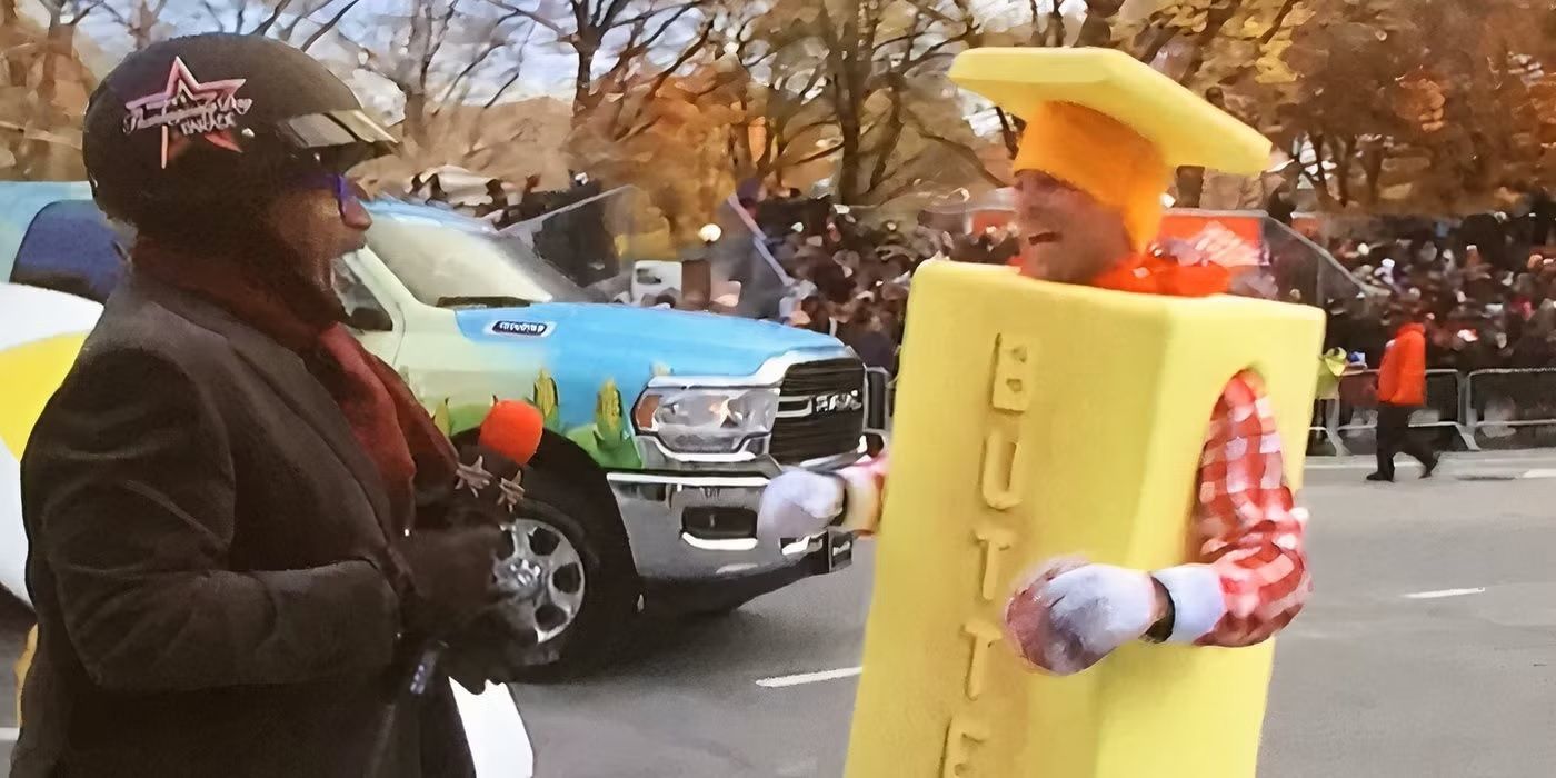 Al Roker is interrupted by a man dressed like a stick of butter during the Macy&rsquo;s Thanksgiving Day Parade.