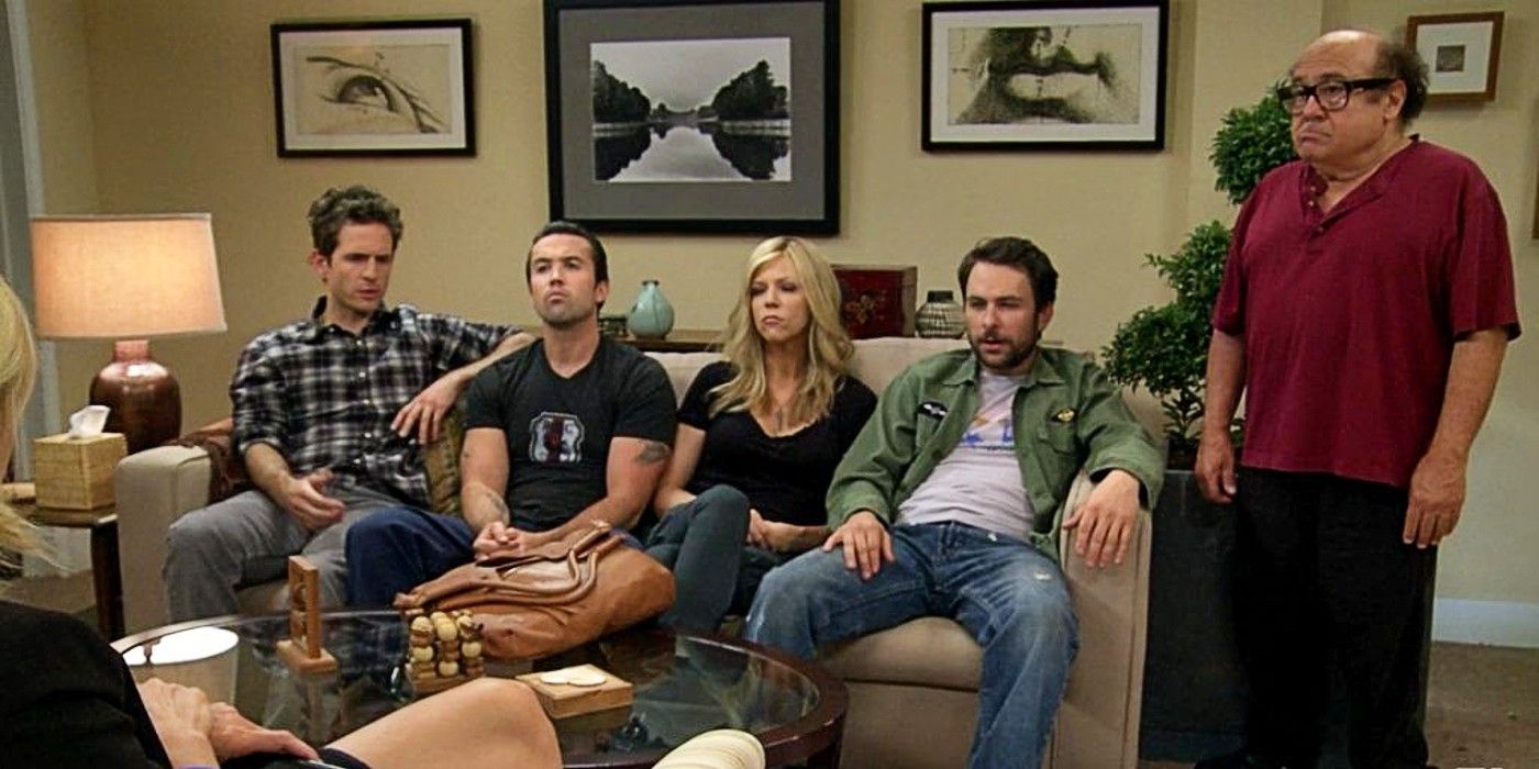 The rest of the cast sit on a couch as Frank stands in front of a therapist in It's Always Sunny in Philadelphia