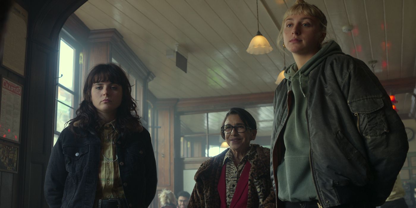 Kathryn Hunter, Gabrielle Creevy, and Ella Lily Hyland standing together in a pub