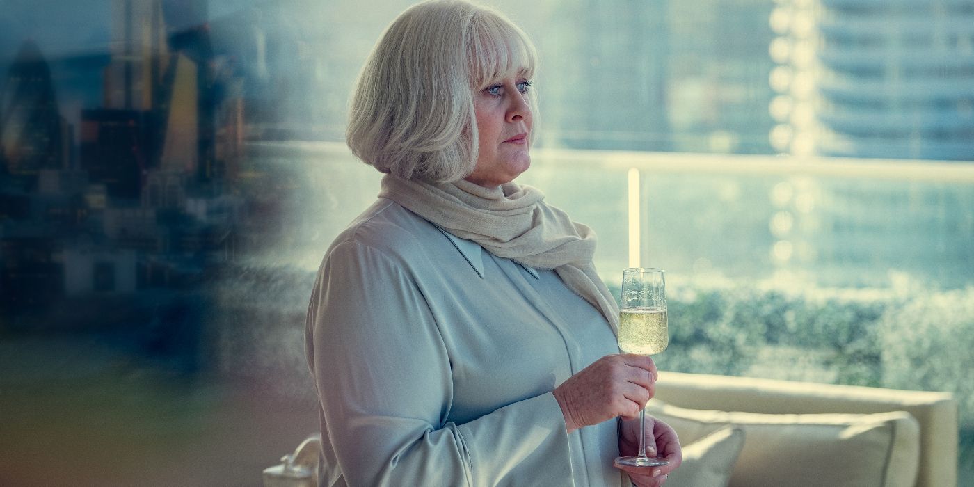 Sarah Lancashire holding a glass of wine