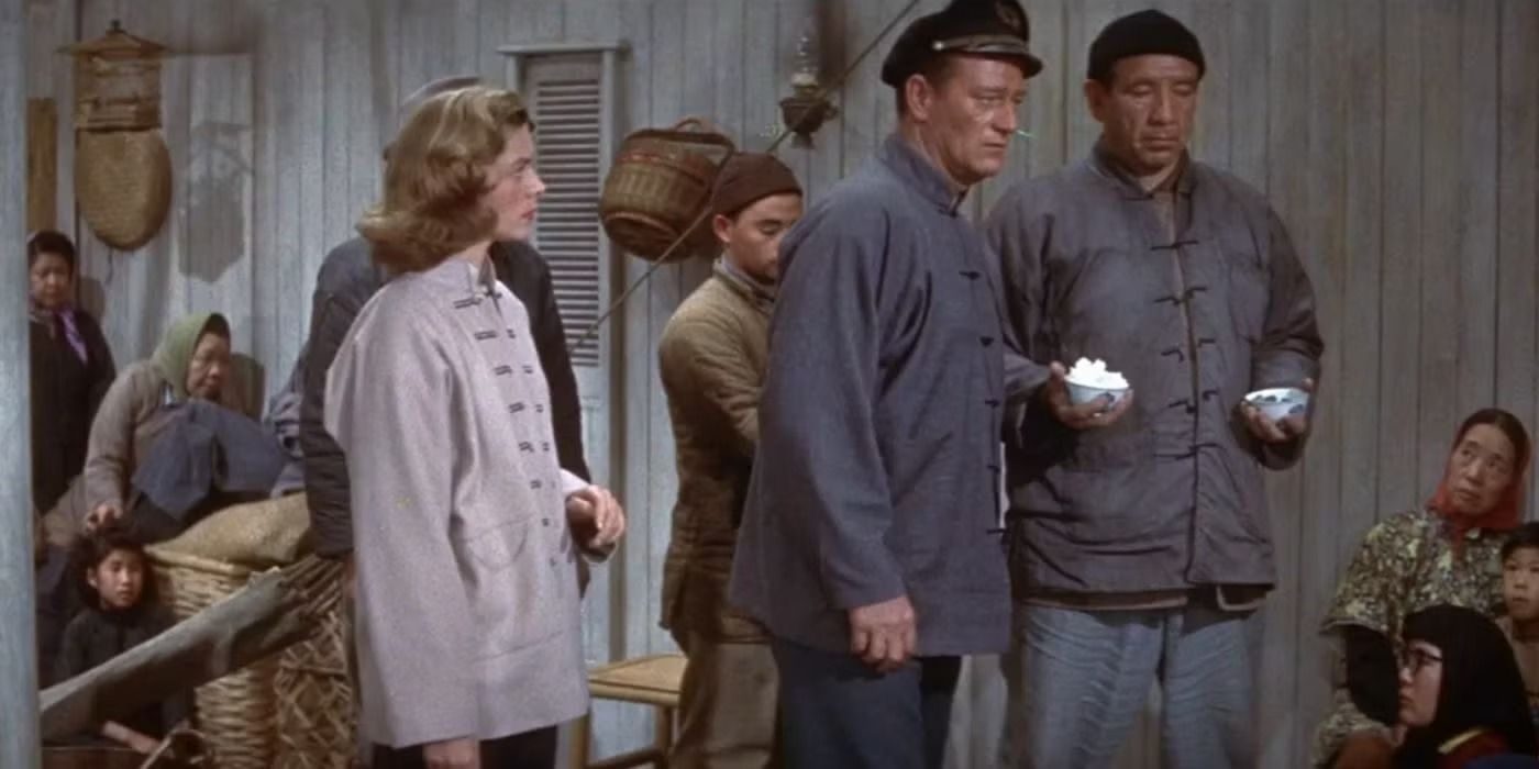 Lauren Bacall and John Wayne in Blood Alley