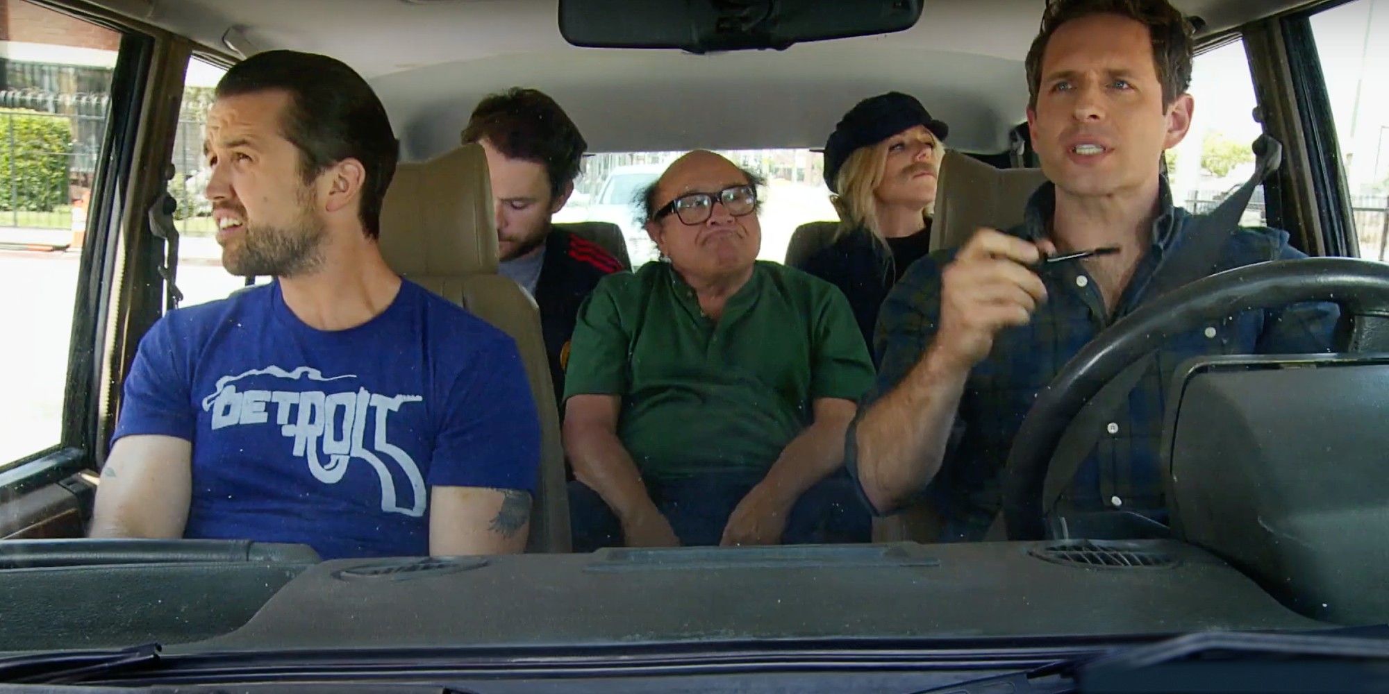 Mac, Charlie, Frank, Dee (in a hat and fake mustache), and Dennis (doing his makeup while driving) in It&rsquo;s Always Sunny in Philadelphia Season 10