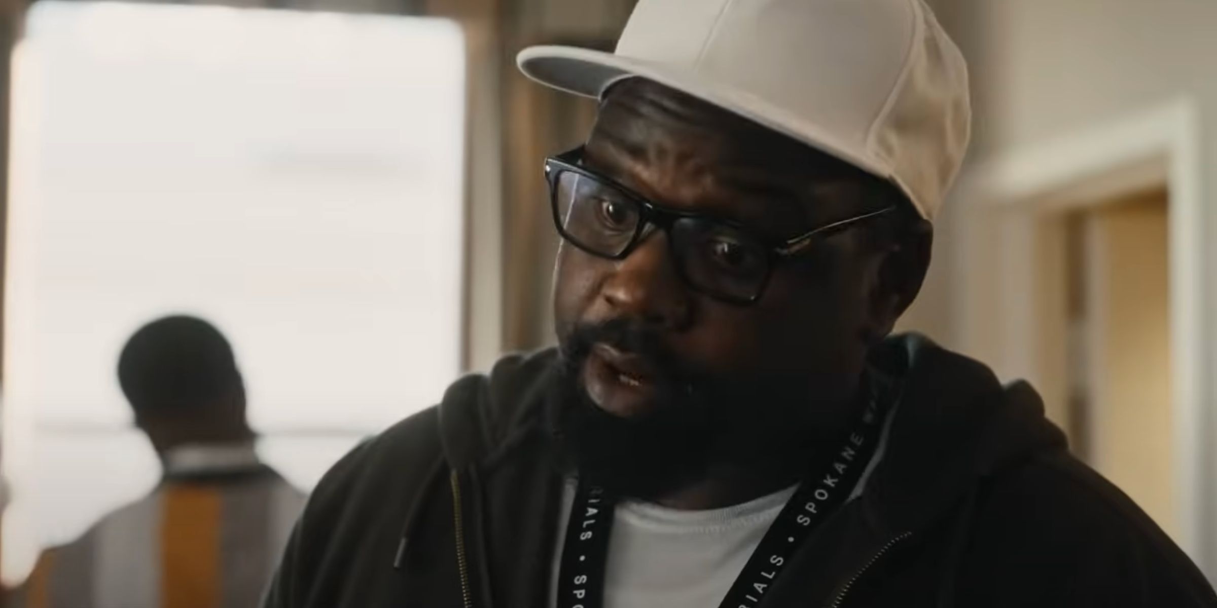 Brian Tyree Henry as Jason wearing a white cap in The Fire Inside