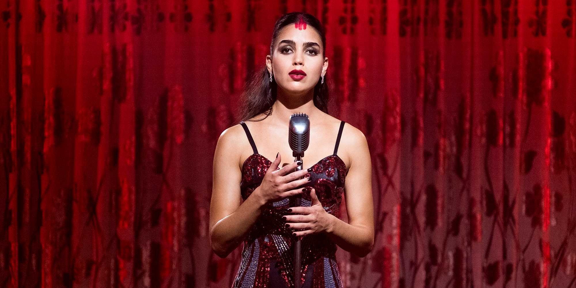 Carmen (Melissa Barrera) singing in 'Carmen'