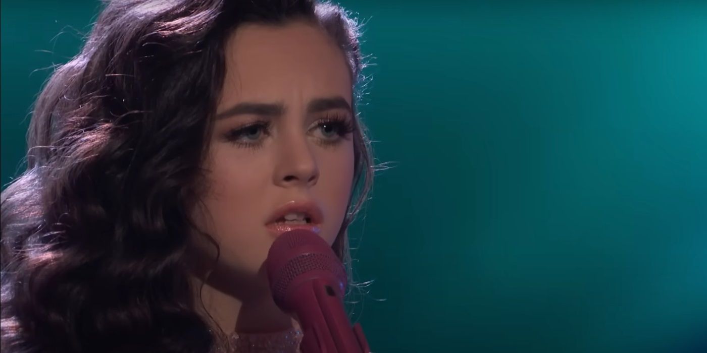 Chevel Shepherd, singing into the microphone, on The Voice Season 15