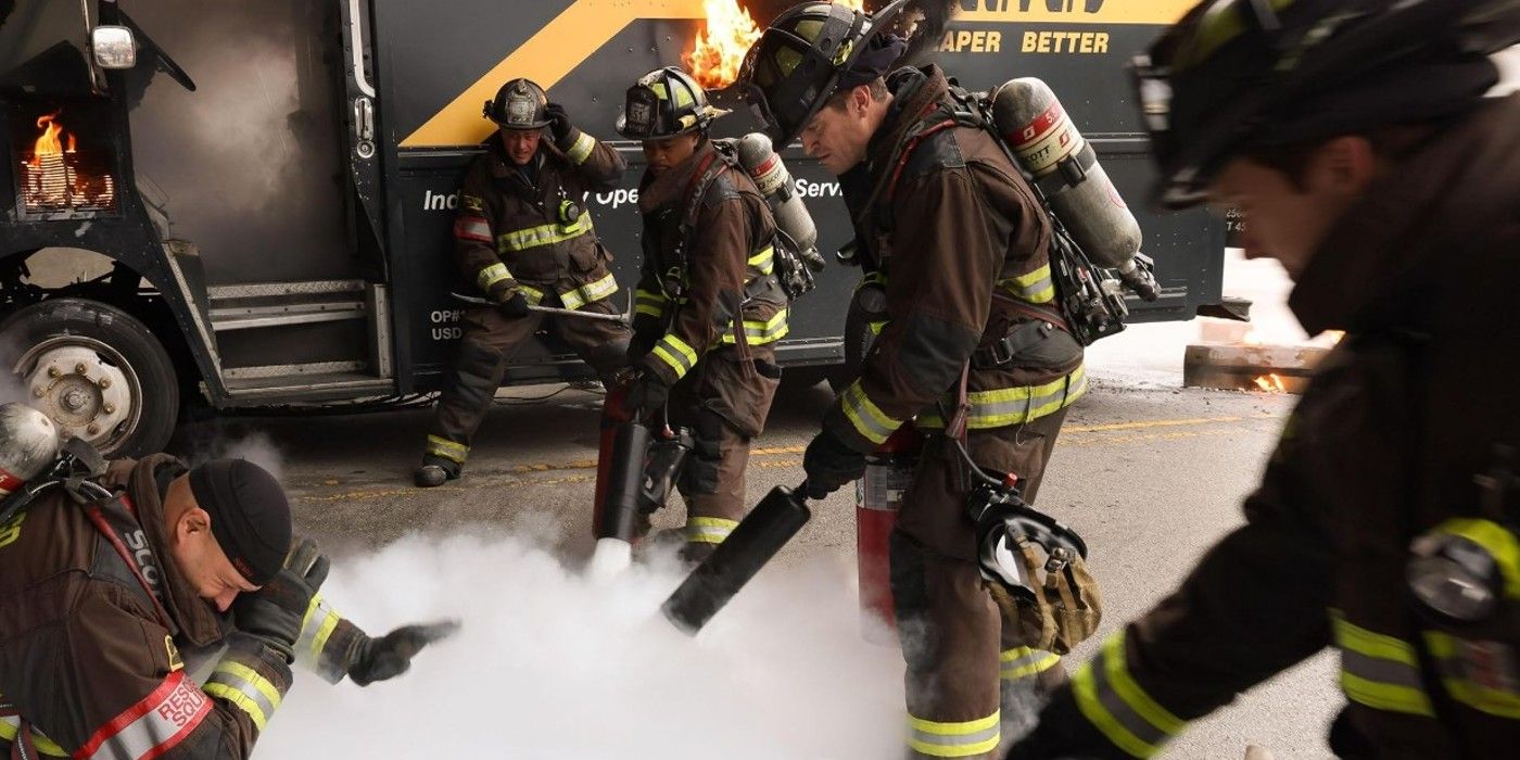 The team of Chicago Fire putting out a fire with extinguishers