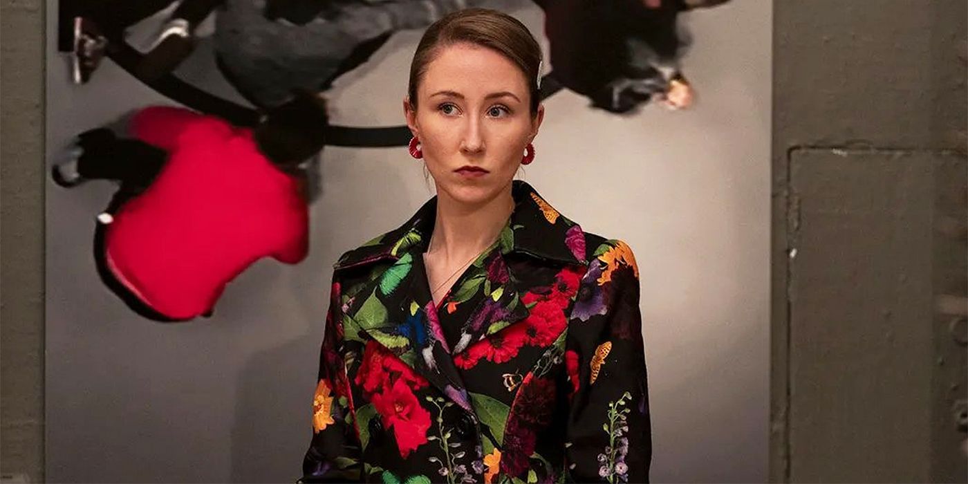 Erin Doherty wearing a colorful flower suit in Chloe
