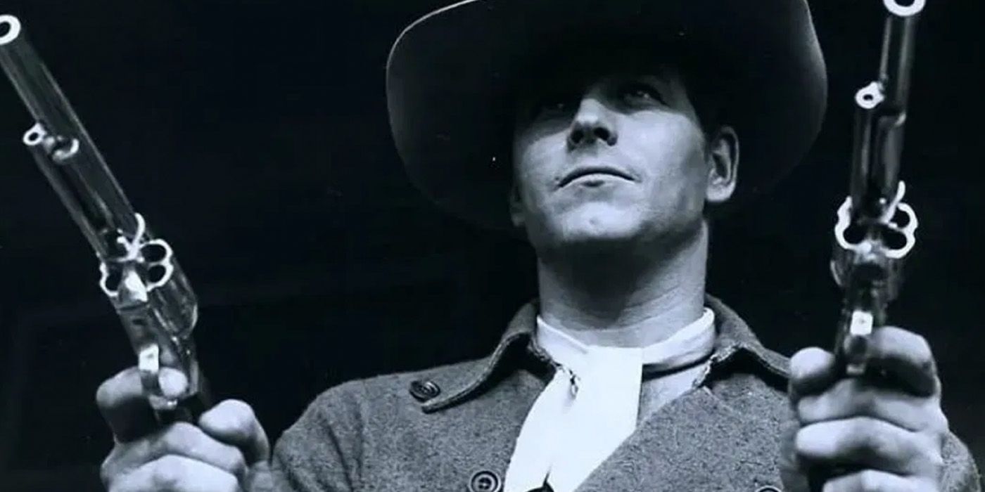 Wayde Preston as Christopher Colt with dueling revolvers in the &lsquo;Colt .45&rsquo; television series.