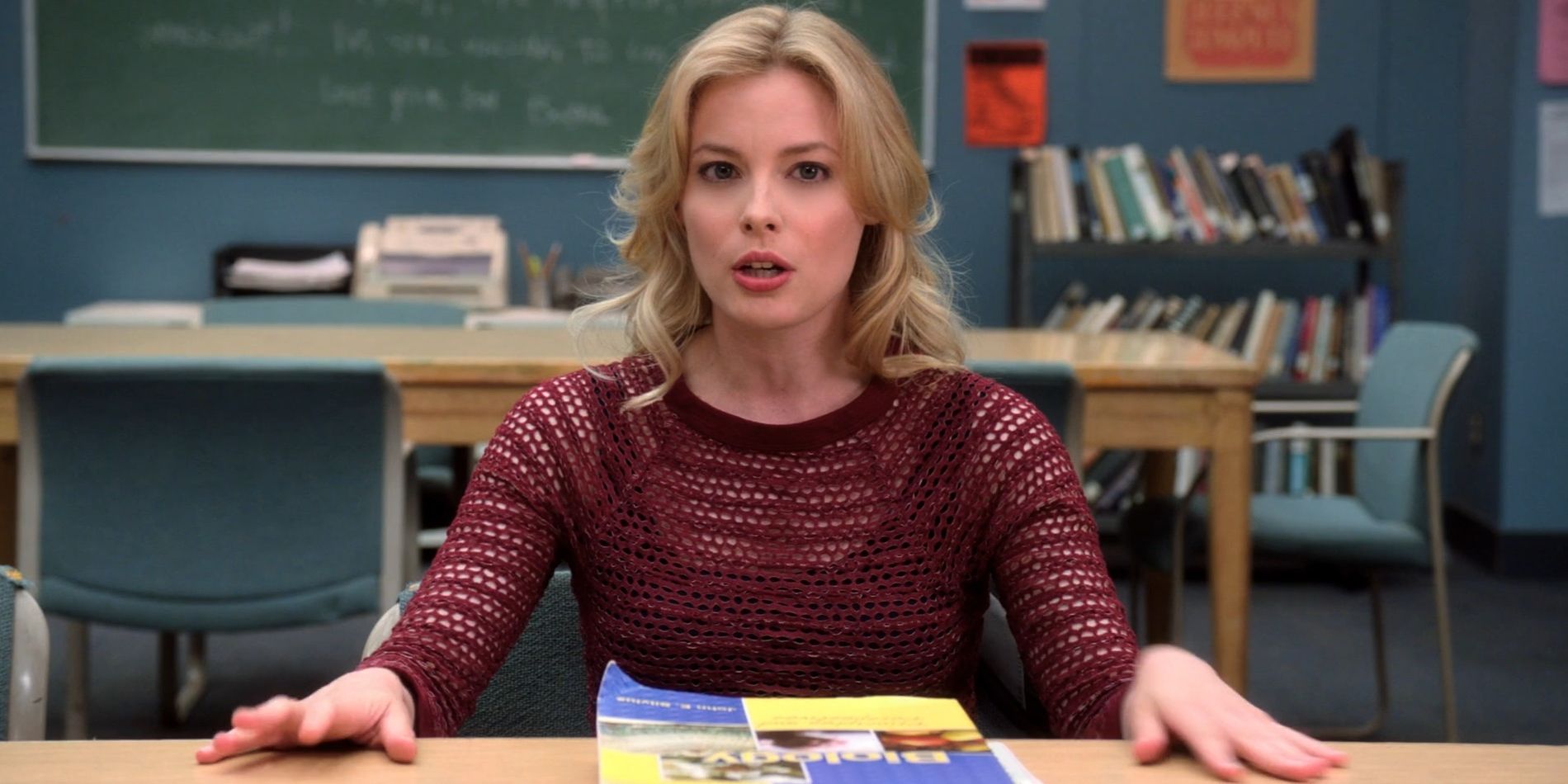 Britta Perry, played by Gillian Jacobs, sits at the study table in 'Community'.