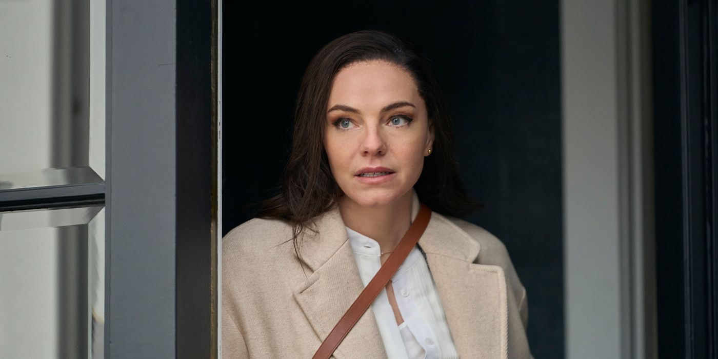Eloise Mumford as Shannon Whitmer standing in a doorway looking out hesitantly in Cross