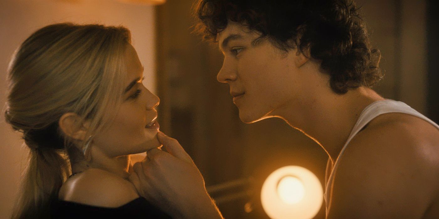 Zac Burgess grasping Sarah Catherine Hook&rsquo;s chin