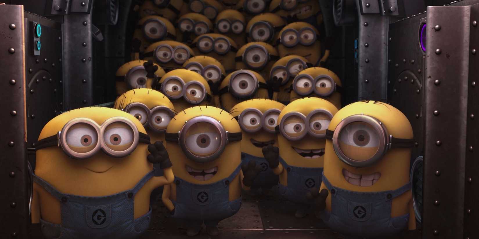 A group of Minions crowds together in a corridor in 'Despicable Me'.