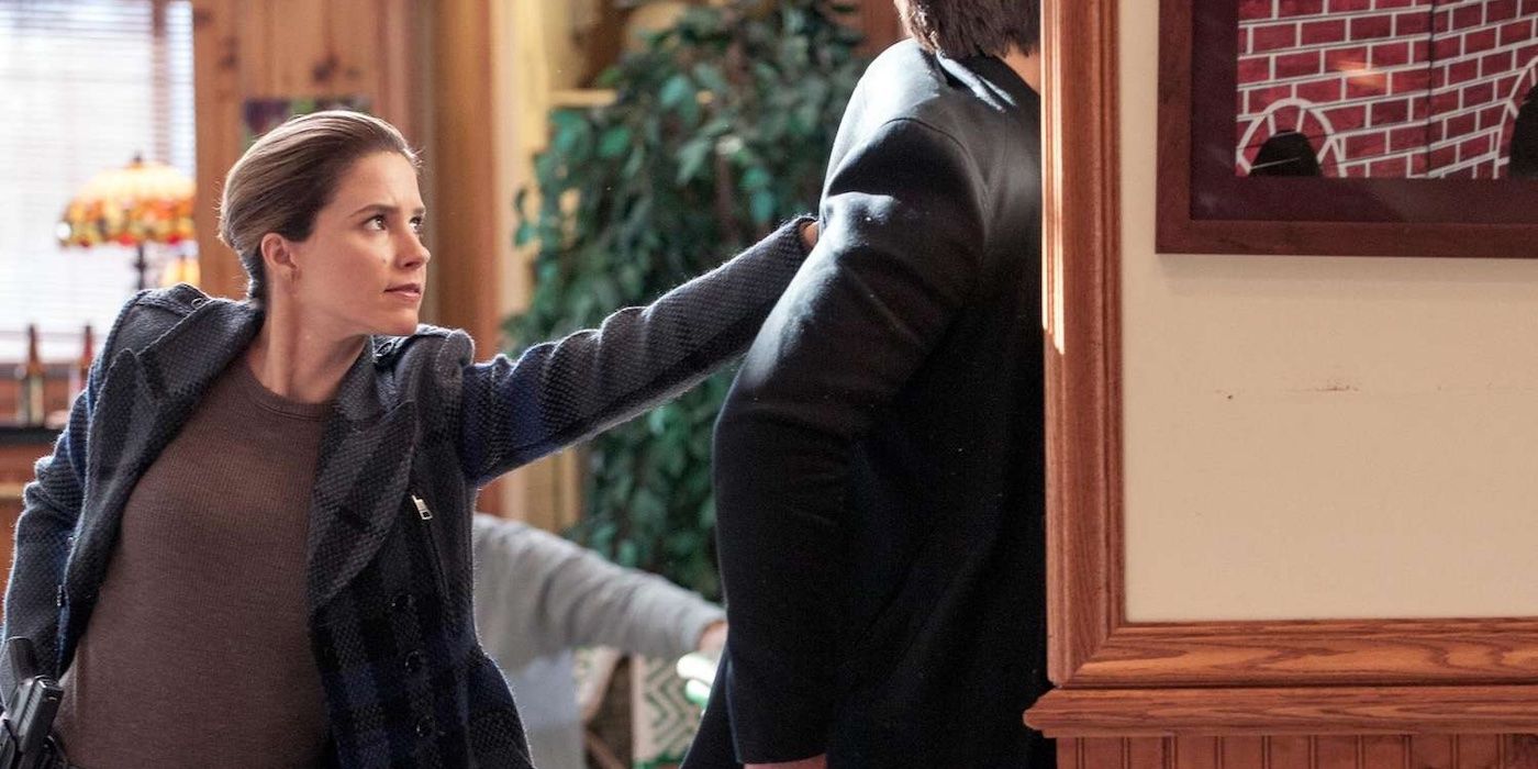 Detective Erin Lindsay (Sophia Bush) pushes perp against the wall in 'Chicago P.D.'