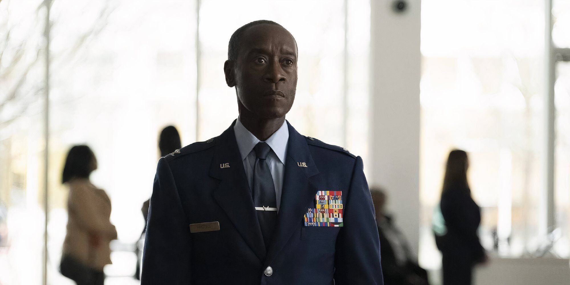 Don Cheadle as Rhodey in The Falcon and the Winter Soldier looking ahead.