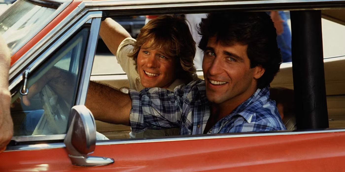 Coy and Vance Duke smile inside their car on The Dukes of Hazzard