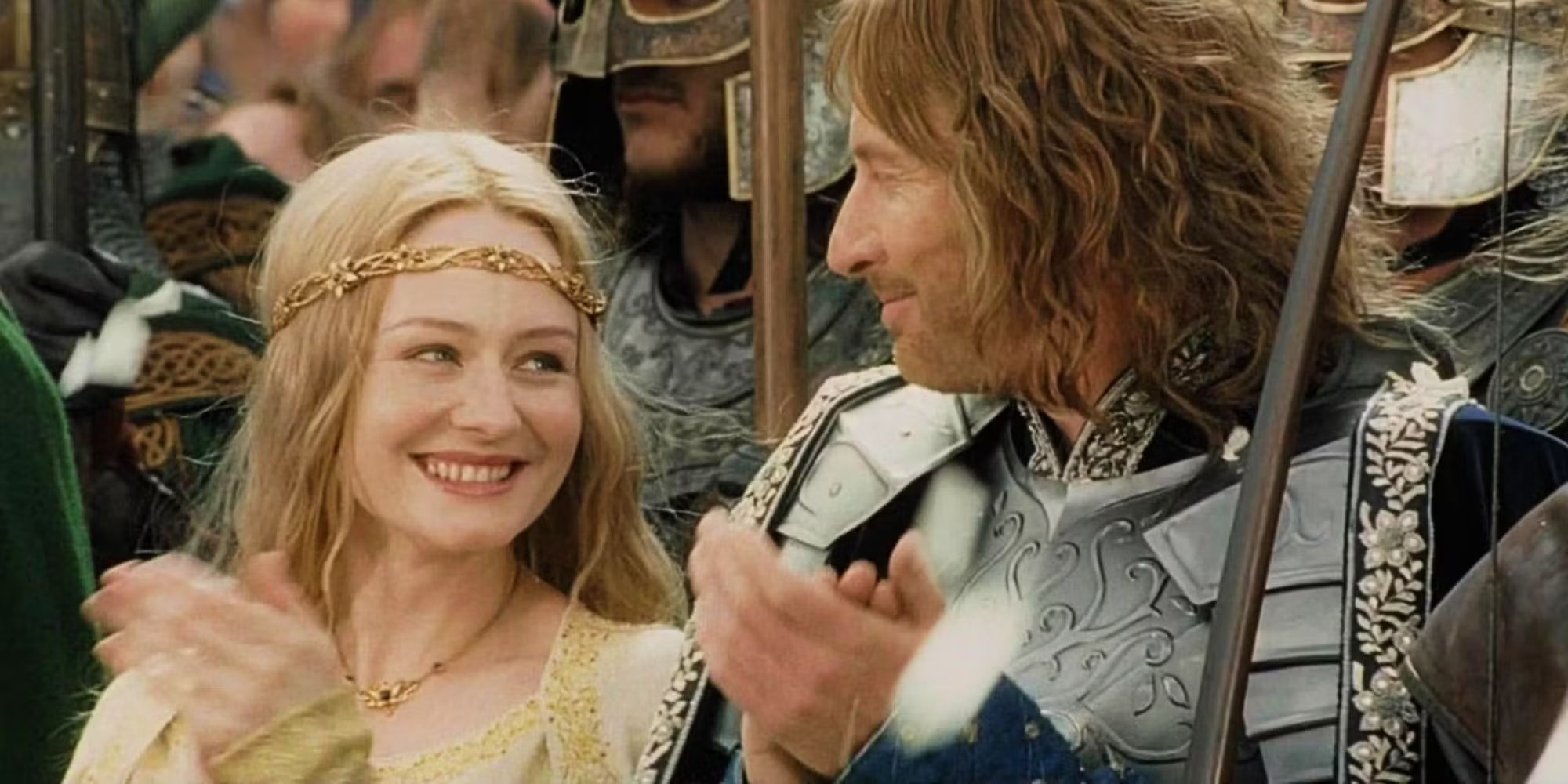 Miranda Otto as Éowyn, smiling up at Faramir, played by David Wenham, in The Lord of the Rings