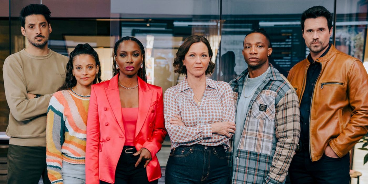 Shanola Hampton as Gabi standing with Brett Dalton and the M&A team in the office in Found