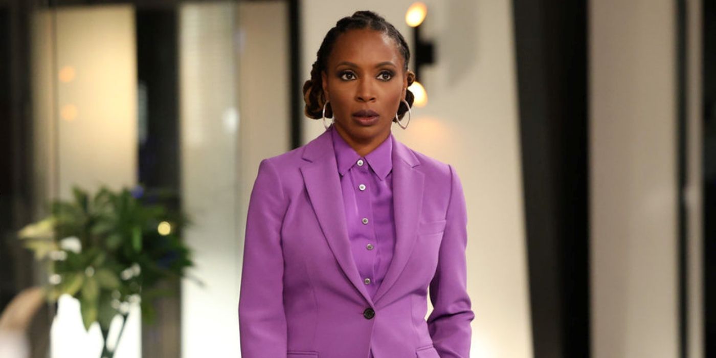 Shanola Hampton as Gabi Mosely standing in a lilac suit in Found