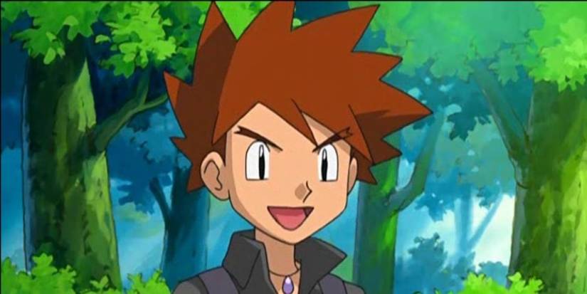 Gary Oak stands outside in a forest and smiles while talking in Pokemon.
