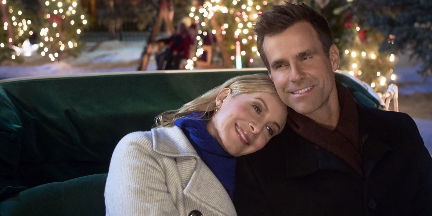 Lauren and James in a carriage in A Cheerful Christmas