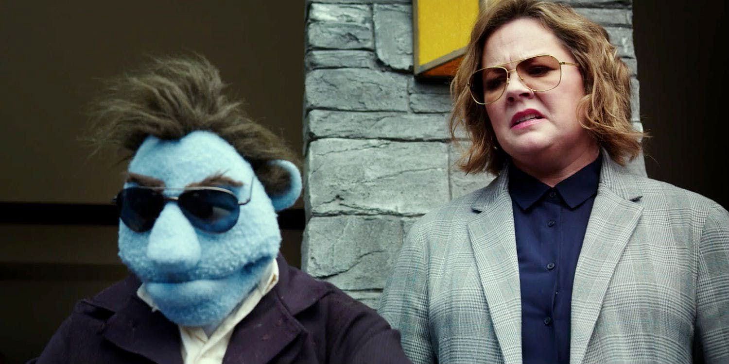 Melissa McCarthy and her puppet partner in The Happytime Murders