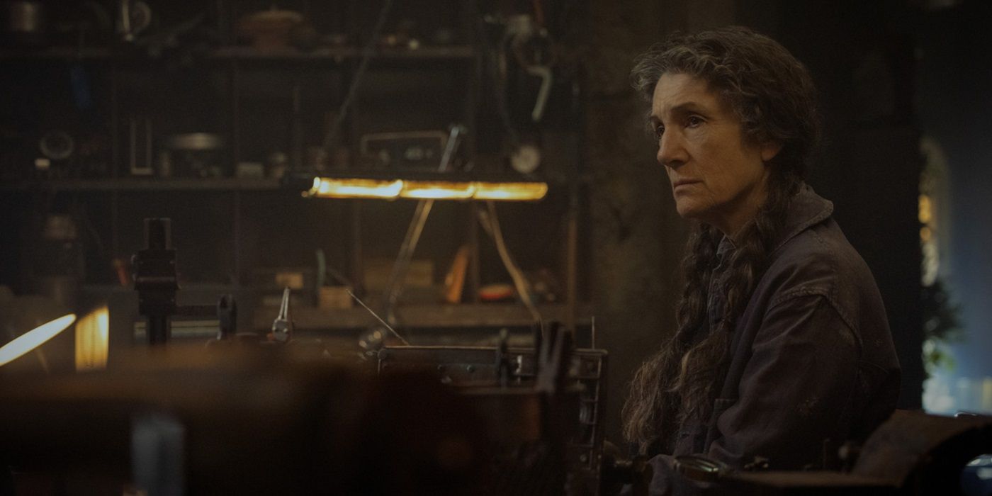 Harriet Walter, sitting down looking worried, as Martha Walker in Silo Season 2 Episode 2