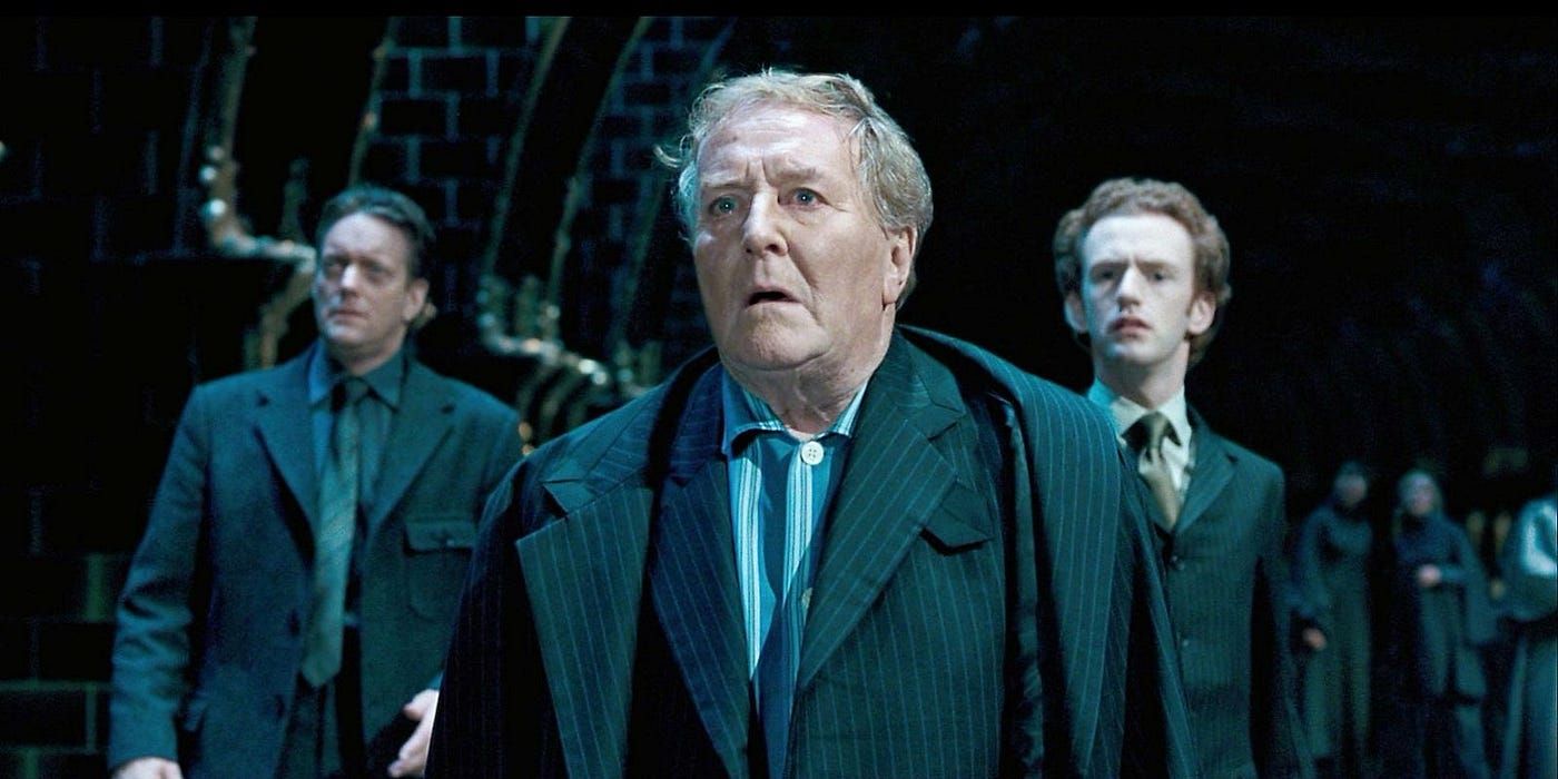 Percy (Chris Rankin) and Cornelius Fudge (Robert Hardy) look scared, Harry Potter and the Order of the Phoenix.