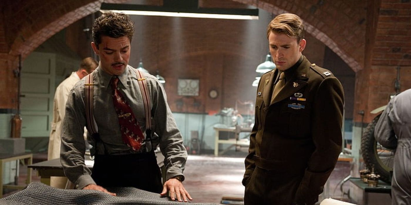 Howard Stark & Steve Rogers look at weapons in an underground bunker in Captain America: The First Avenger.