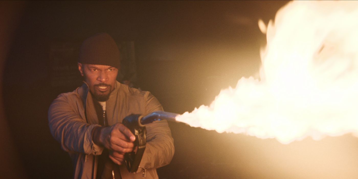 Jamie Foxx lighting a flame in Back in Action.