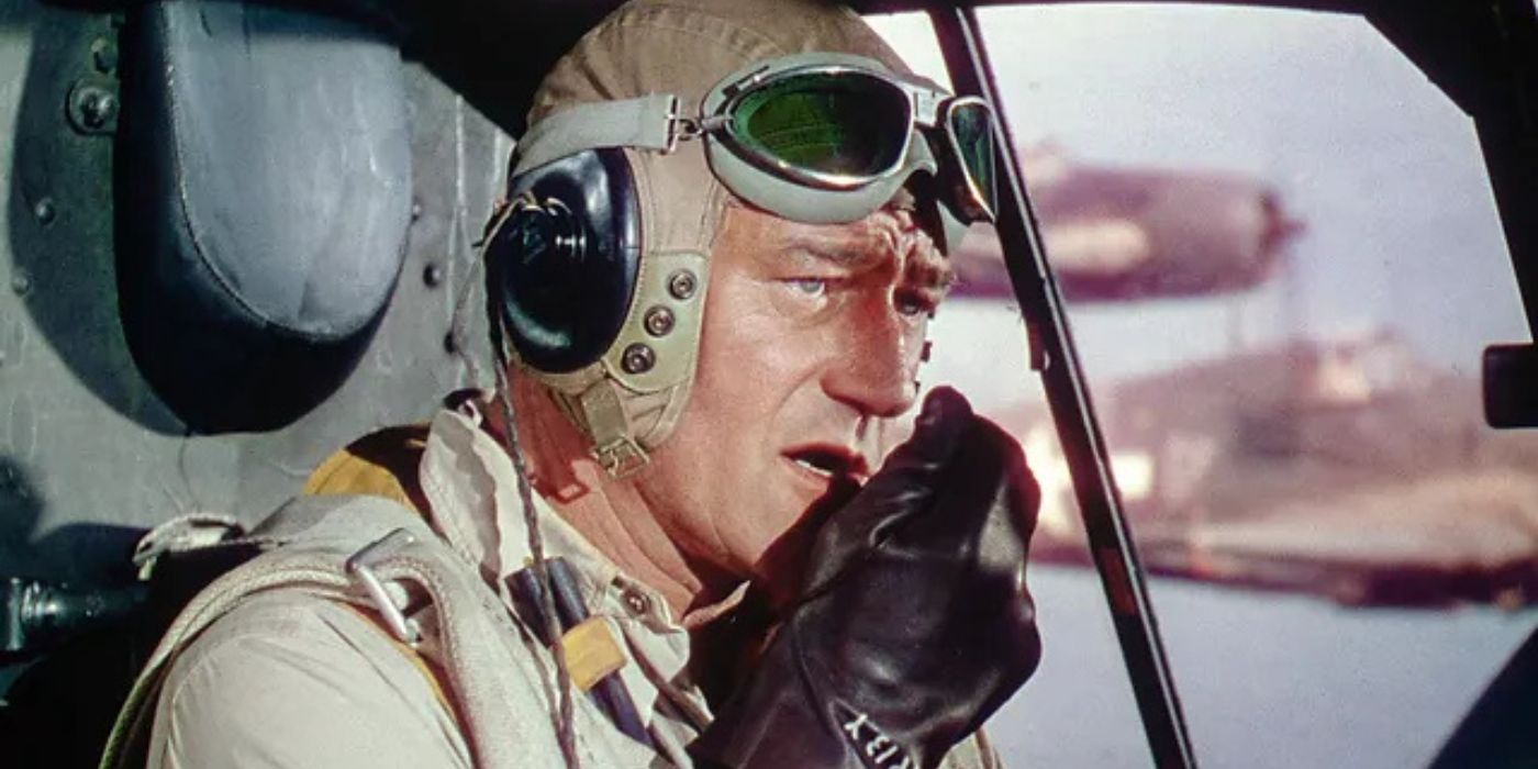 John Wayne as a WWII pilot talking into a radio in Flying Leathernecks