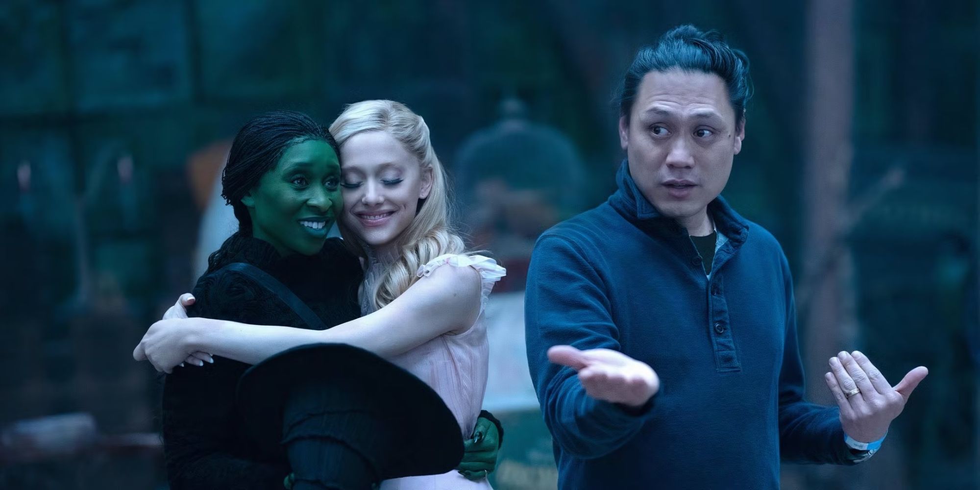 Jon M. Chu directs Cynthia Erivo and Ariana Grande on the set of Wicked.