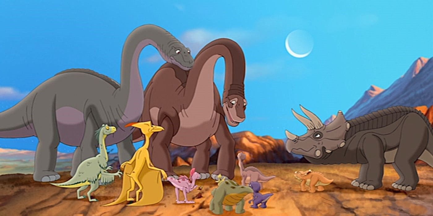 Dinosaurs talk together on a prehistoric landscape in The Land Before Time XIV: Journey of the Brave.