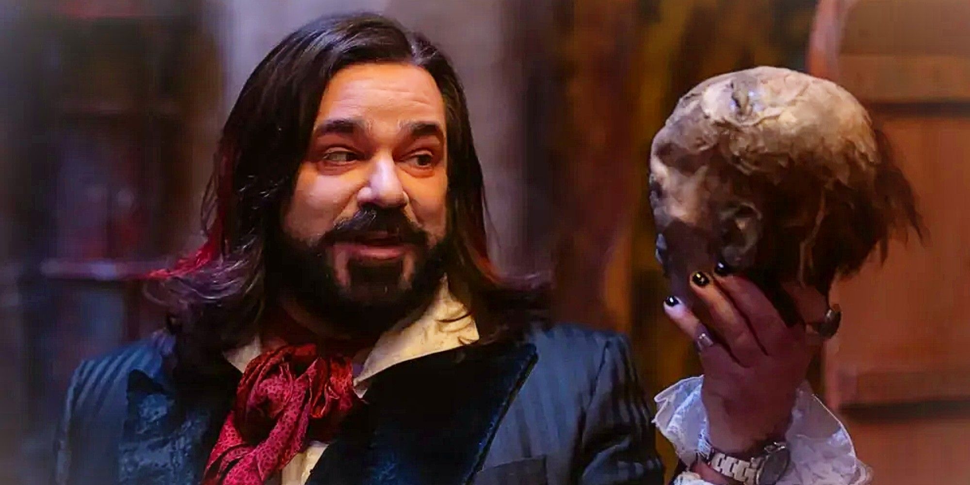 Laszlo Cravensworth holding a human head in What We Do in the Shadows WWDITS