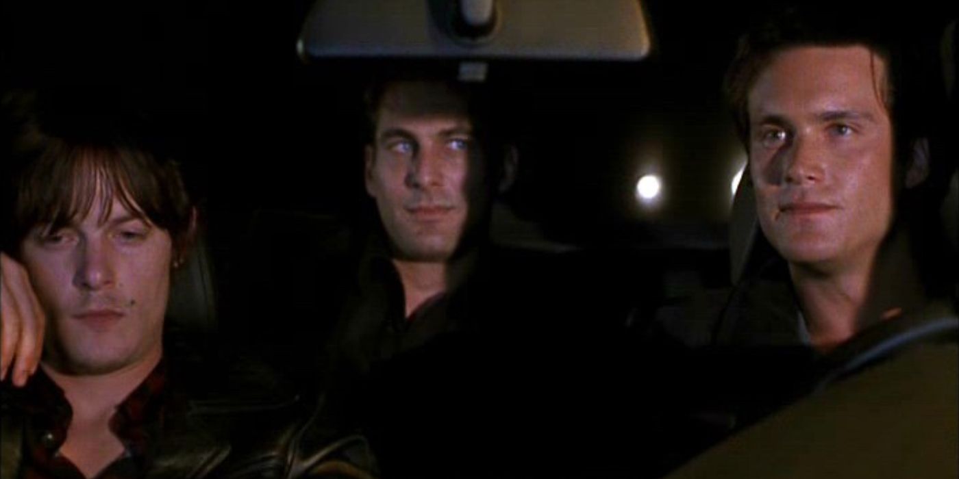 Three men sit in a car and look anxious in Let the Devil Wear Black (1999).