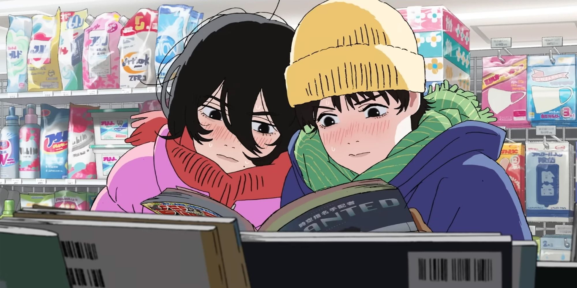 Two young girls wearing winter coats and reading a manga together in a convenience store in 'Look Back' (2024)